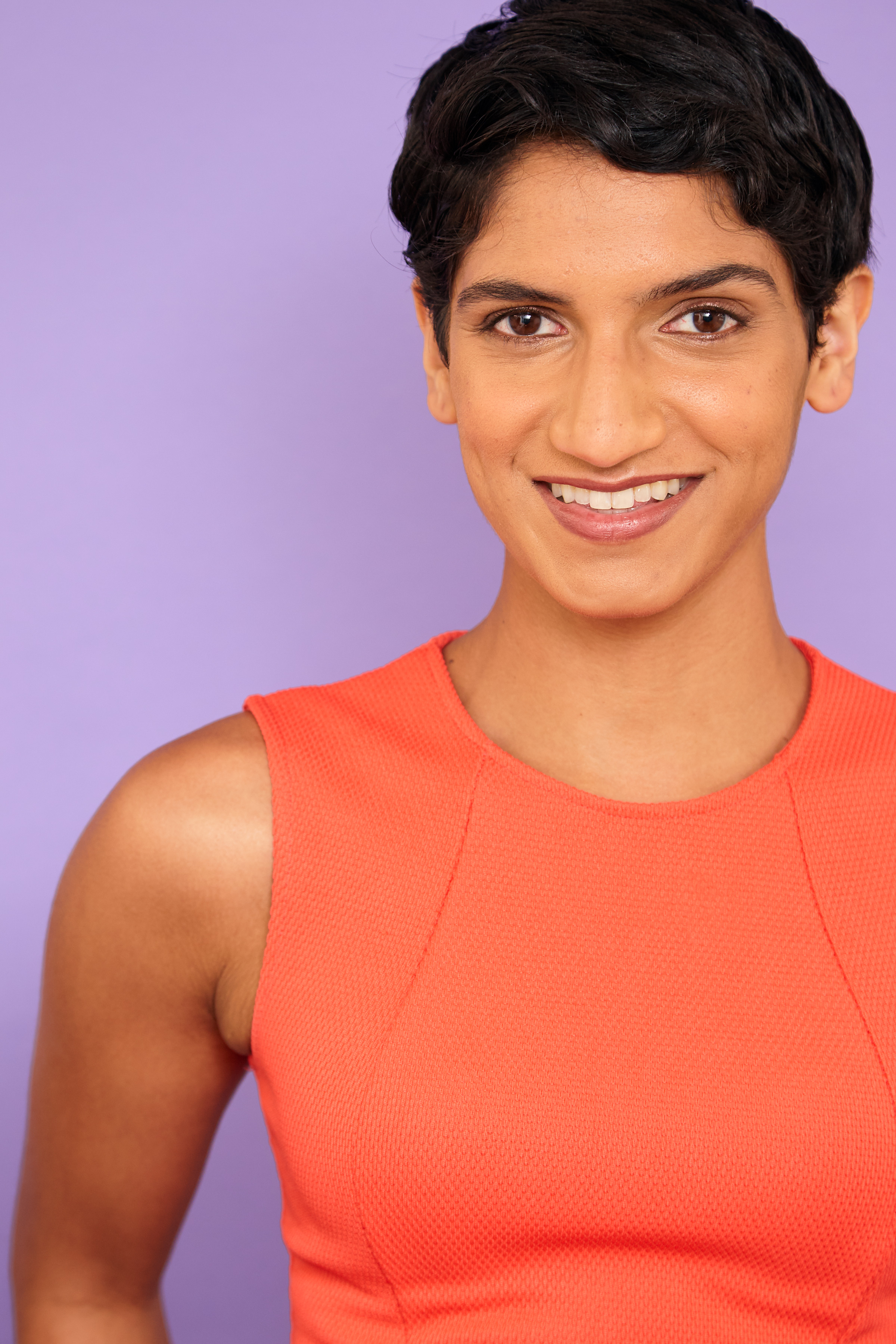 Pallavi Gunalan Headshot Orange 1